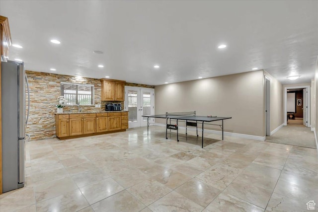 10605 S Willow Valley Rd W, South Jordan, UT 84095 - rec room featuring recessed lighting, a sink, baseboards, and french doors