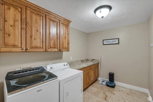 10605 S Willow Valley Rd W, South Jordan, UT 84095 - washroom with cabinet space, washer and dryer, and baseboards