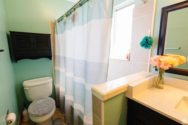 374 W Melba Dr S, Tooele, UT 84074 - full bathroom with vanity, toilet, and curtained shower
