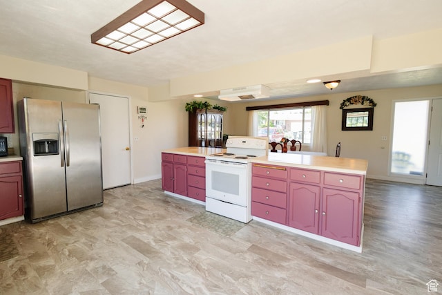 374 W Melba Dr S, Tooele, UT 84074 - kitchen with stainless steel refrigerator with ice dispenser, electric range, light countertops, baseboards, and light flooring
