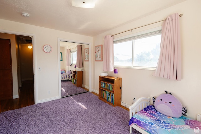 374 W Melba Dr S, Tooele, UT 84074 - carpeted bedroom with a closet and baseboards