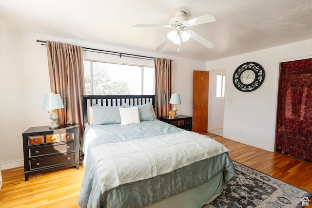 374 W Melba Dr S, Tooele, UT 84074 - bedroom featuring wood finished floors, baseboards, and ceiling fan