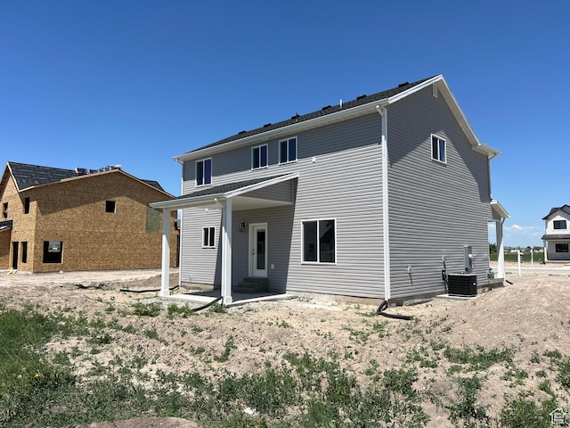 1154 E 1150 S, Garland, UT 84312 - back of house with central air condition unit and entry steps