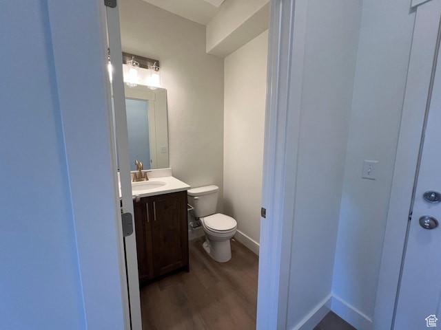 1154 E 1150 S, Garland, UT 84312 - half bath with wood finished floors, vanity, toilet, and baseboards