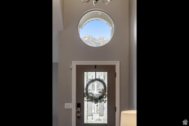 12214 S Hidden Valley Rd, Sandy, UT 84092 - foyer entrance with a chandelier