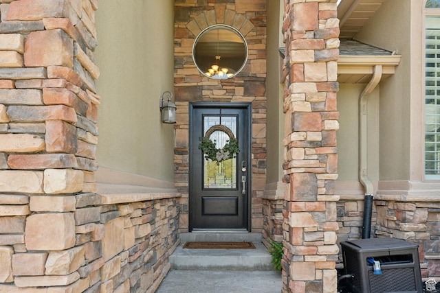 12214 S Hidden Valley Rd, Sandy, UT 84092 - view of exterior entry featuring stone siding