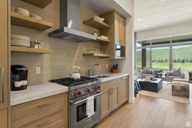 6312 Double Deer Loop, Park City, UT 84098 - kitchen with open shelves, wall chimney exhaust hood, luxury range, a sink, and tasteful backsplash