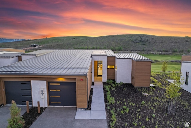 6312 Double Deer Loop, Park City, UT 84098 - modern home with a standing seam roof, metal roof, a mountain view, and driveway