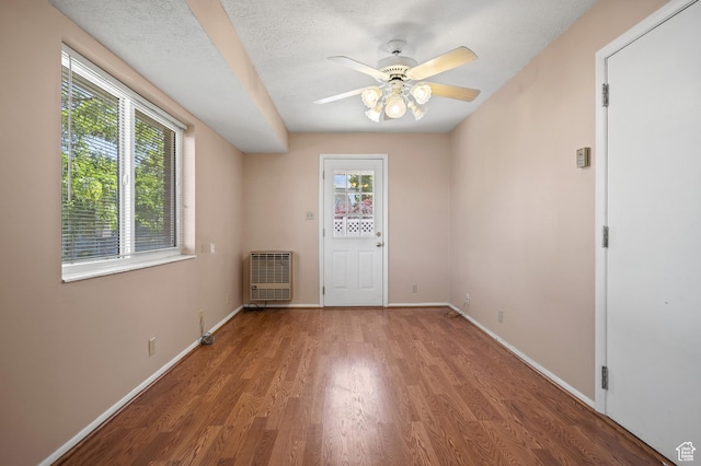 95 E 1400 S, Bountiful, UT 84010 - unfurnished room featuring heating unit, wood finished floors, ceiling fan, and baseboards