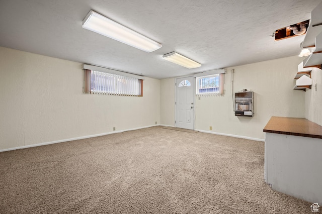 95 E 1400 S, Bountiful, UT 84010 - basement featuring light colored carpet, baseboards, and a textured ceiling