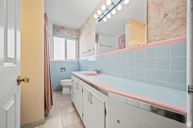 95 E 1400 S, Bountiful, UT 84010 - bathroom featuring tile patterned floors, vanity, tile walls, toilet, and a shower with curtain