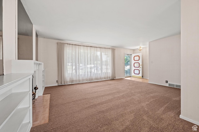 95 E 1400 S, Bountiful, UT 84010 - unfurnished living room with carpet floors and baseboards