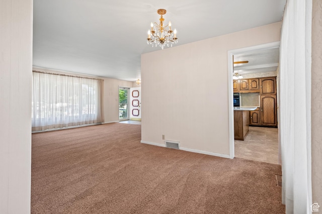 95 E 1400 S, Bountiful, UT 84010 - unfurnished room with light colored carpet, a chandelier, and baseboards