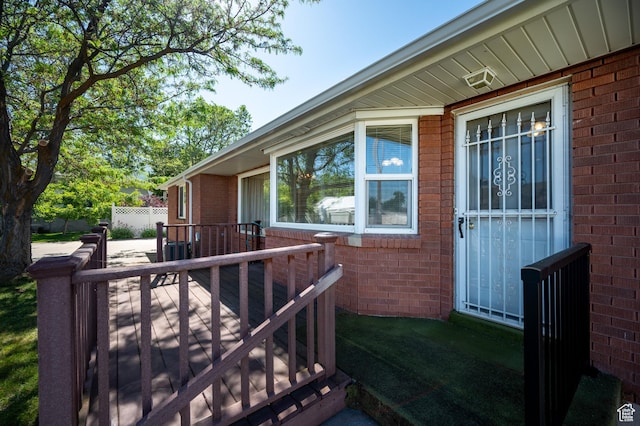 95 E 1400 S, Bountiful, UT 84010 - property entrance with brick siding and a wooden deck