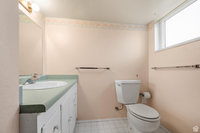 95 E 1400 S, Bountiful, UT 84010 - half bathroom featuring toilet, vanity, baseboards, and tile patterned floors