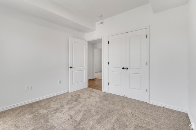 3478 S Cozy River Pl W Unit 210, West Valley City, UT 84119 - unfurnished bedroom with carpet flooring, baseboards, and a closet