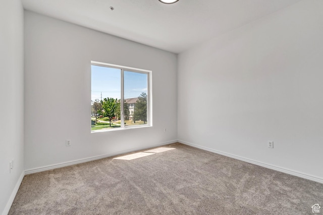 3478 S Cozy River Pl W Unit 210, West Valley City, UT 84119 - carpeted spare room featuring baseboards