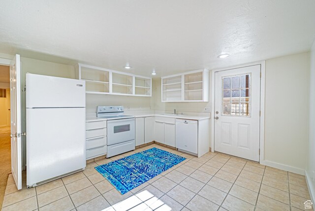 1820 E Redondo Ave S, Salt Lake City, UT 84108 - kitchen featuring white appliances, open shelves, light tile patterned flooring, light countertops, and white cabinetry