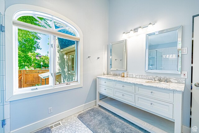 1820 E Redondo Ave S, Salt Lake City, UT 84108 - full bath with double vanity and baseboards