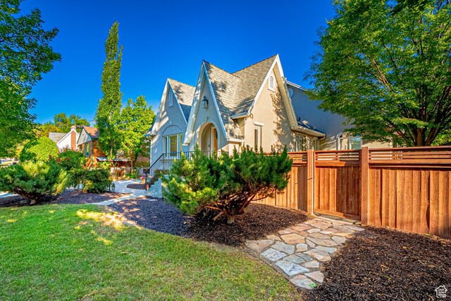 1820 E Redondo Ave S, Salt Lake City, UT 84108 - view of side of home featuring stucco siding and a shingled roof