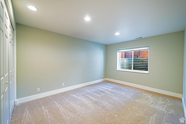 1820 E Redondo Ave S, Salt Lake City, UT 84108 - spare room with light carpet, baseboards, and recessed lighting