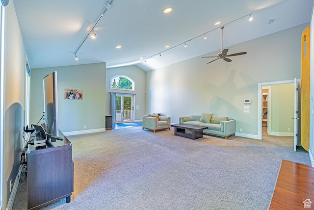 1820 E Redondo Ave S, Salt Lake City, UT 84108 - carpeted living room featuring track lighting, vaulted ceiling, baseboards, a ceiling fan, and recessed lighting