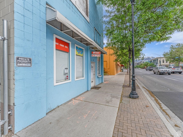 40 S Freedom Blvd, Provo, UT 84601 - view of asphalt street featuring sidewalks, street lighting, and curbs