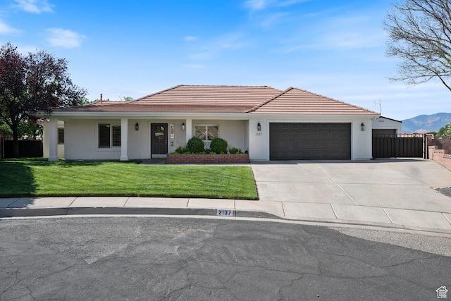 2137 E 170th Cir S, St George, UT 84790 - single story home featuring an attached garage, stucco siding, driveway, a tile roof, and a gate