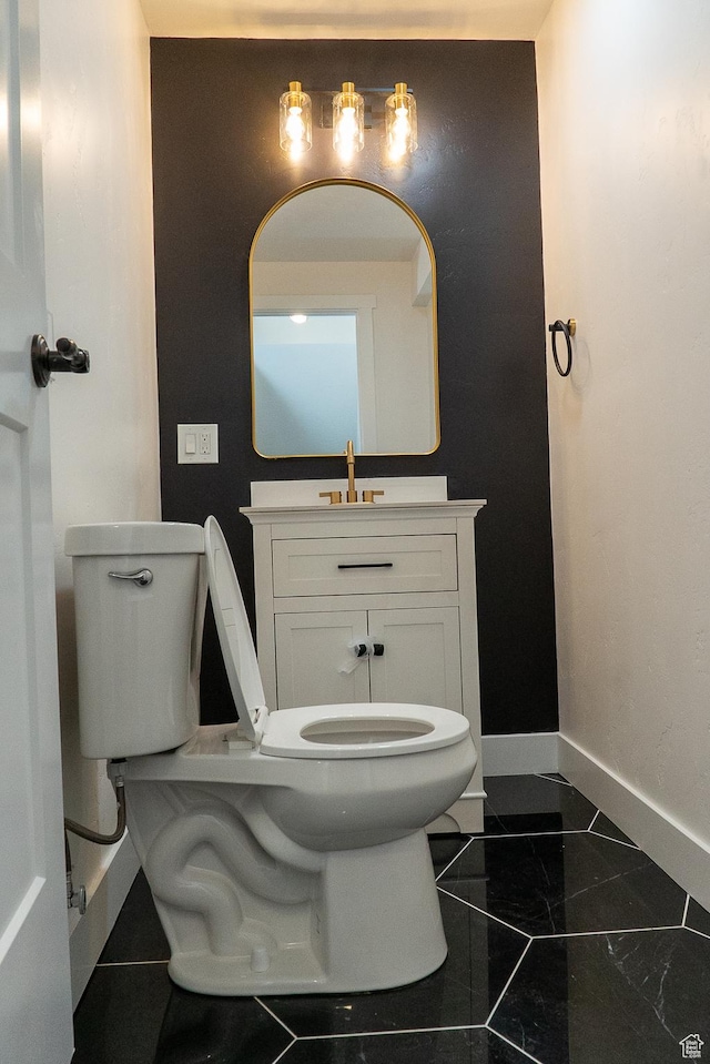 4515 N Norfork Cir, Provo, UT 84604 - bathroom with toilet, baseboards, vanity, and marble finish flooring
