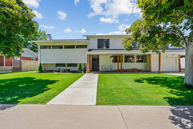 845 N 950 W, Provo, UT 84604 - view of front of property with a chimney, a porch, and a garage