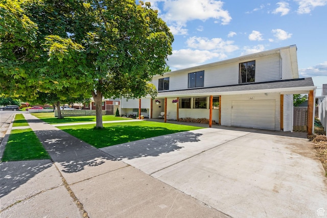 845 N 950 W, Provo, UT 84604 - view of front of property with a front yard, a garage, and driveway