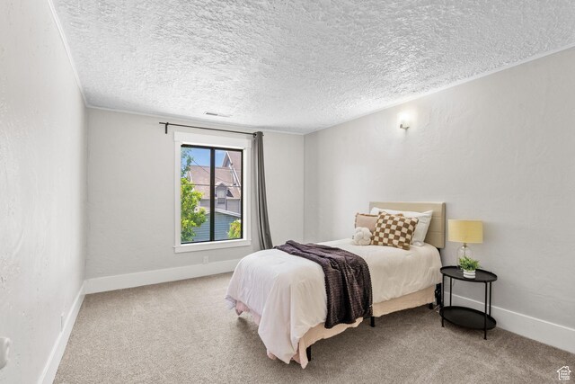 845 N 950 W, Provo, UT 84604 - bedroom with carpet, a textured ceiling, and baseboards