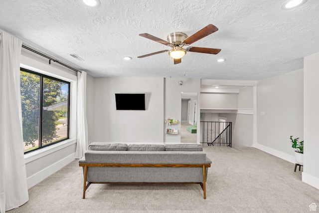 845 N 950 W, Provo, UT 84604 - living area with carpet floors, recessed lighting, a ceiling fan, baseboards, and a textured ceiling