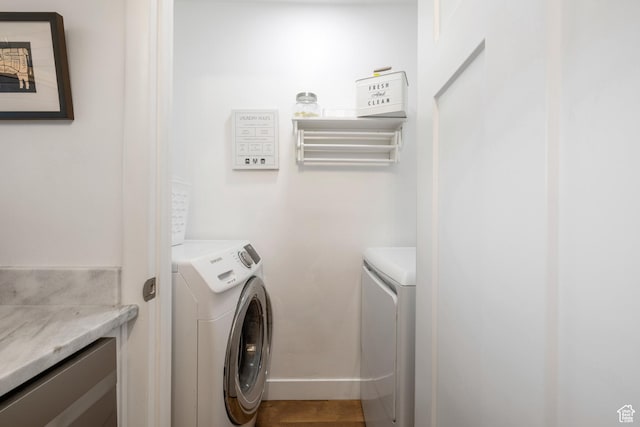 7085 N 2200 W Unit 1I, Park City, UT 84098 - laundry room with washer and clothes dryer and baseboards