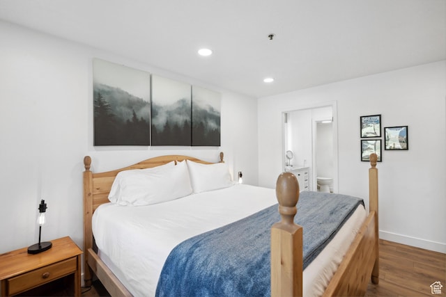 7085 N 2200 W Unit 1I, Park City, UT 84098 - bedroom featuring wood finished floors, recessed lighting, baseboards, and ensuite bathroom