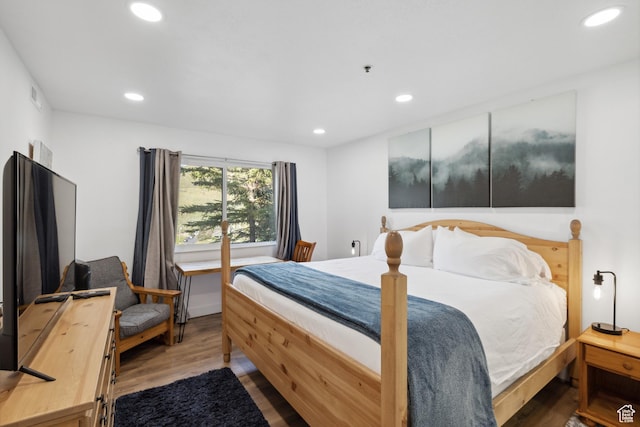 7085 N 2200 W Unit 1I, Park City, UT 84098 - bedroom with recessed lighting and wood finished floors