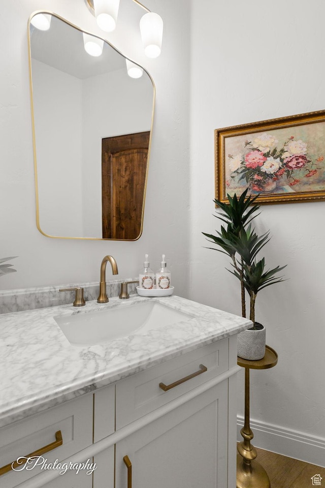 916 E Apache Dr, Washington, UT 84780 - bathroom featuring vanity and baseboards