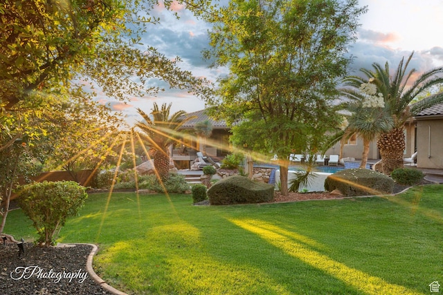 916 E Apache Dr, Washington, UT 84780 - view of grassy yard featuring an outdoor pool