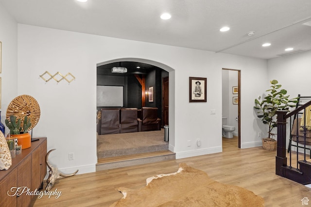 916 E Apache Dr, Washington, UT 84780 - corridor featuring arched walkways, wood finished floors, recessed lighting, stairway, and baseboards