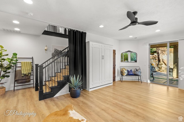 916 E Apache Dr, Washington, UT 84780 - foyer featuring wood finished floors, stairway, recessed lighting, ceiling fan, and baseboards