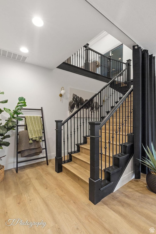 916 E Apache Dr, Washington, UT 84780 - staircase with wood finished floors, baseboards, and recessed lighting