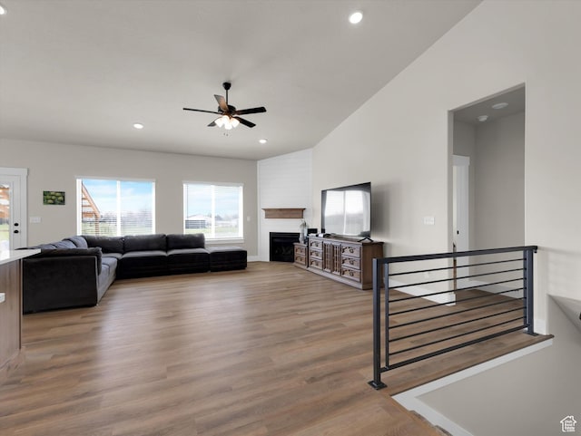 3425 W Isabel Way, West Haven, UT 84401 - living room with ceiling fan, wood finished floors, a large fireplace, recessed lighting, and vaulted ceiling