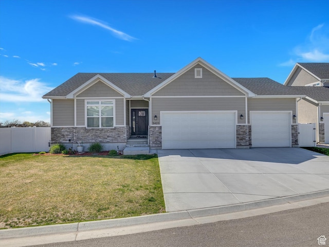 3425 W Isabel Way, West Haven, UT 84401 - craftsman house with an attached garage, driveway, and stone siding