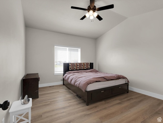 3425 W Isabel Way, West Haven, UT 84401 - bedroom with vaulted ceiling, baseboards, wood finished floors, and a ceiling fan