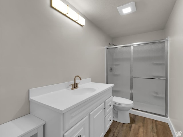 3425 W Isabel Way, West Haven, UT 84401 - full bath with a shower stall, wood finished floors, toilet, and vanity