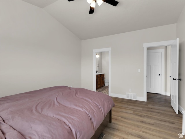3425 W Isabel Way, West Haven, UT 84401 - bedroom featuring light wood finished floors, baseboards, vaulted ceiling, connected bathroom, and ceiling fan