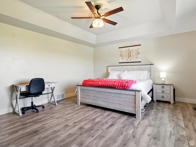 2699 N 3475 W, Plain City, UT 84404 - bedroom featuring a raised ceiling, wood finished floors, baseboards, and ceiling fan