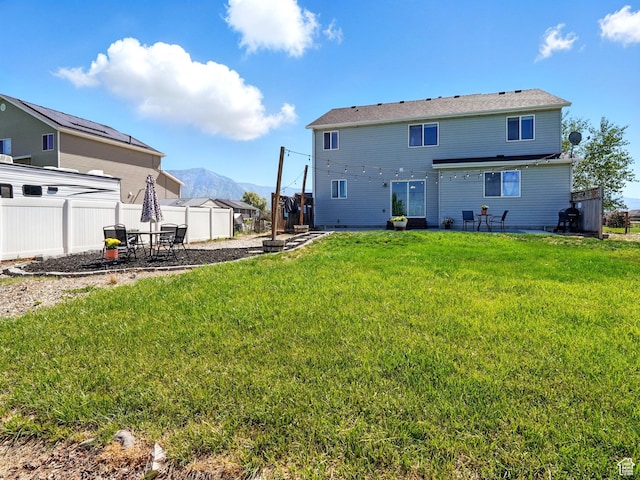 2699 N 3475 W, Plain City, UT 84404 - back of house featuring a patio area and a mountain view