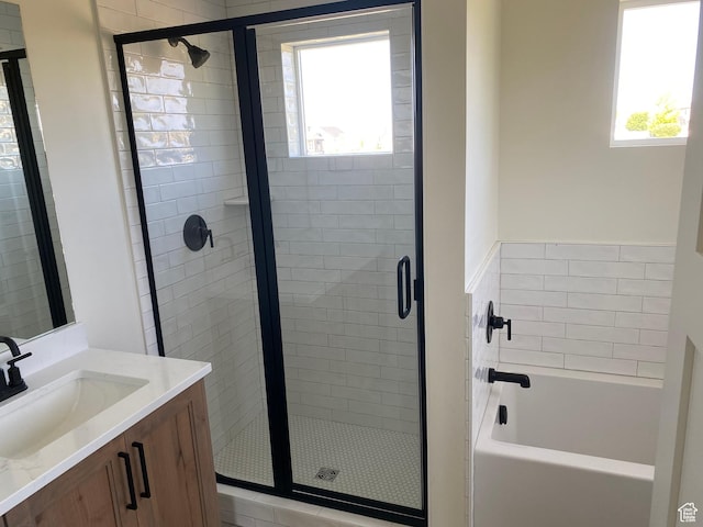 4618 W 75 N Unit 404, West Point, UT 84015 - full bath featuring vanity, a stall shower, and a garden tub