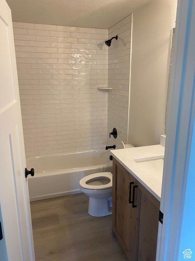 4618 W 75 N Unit 404, West Point, UT 84015 - bathroom with wood finished floors, vanity, toilet, and  shower combination